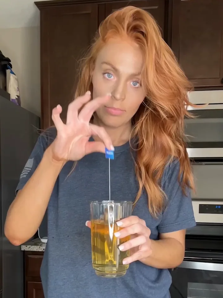 A creator with her Lulutox Sleep Tea pouch in the kitchen